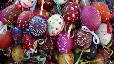 Easter painted eggs with ribbons close up Vídeo Stock 332331673