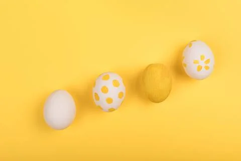 Easter painted eggs on yellow background Stock Photos