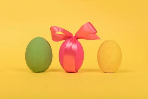 Easter painted eggs on yellow background Stock Photos