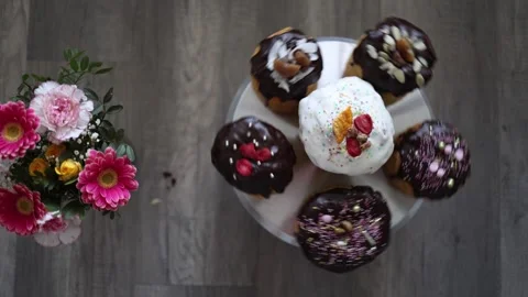 Easter panettone sweet bread chocolate glaze bouquet flowers top view rustic sty Stock Footage 307142952