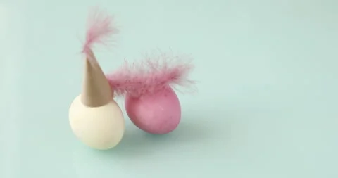 Easter party concept: Easter eggs as lady and gentleman heads with hats Stock-Footage 103417808
