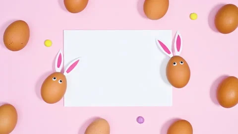 Easter pattern with paper copy space and eggs. Stop motion Stock Footage 171364257