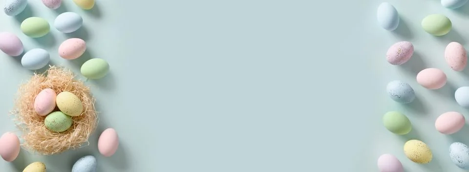 Easter pattern with pastel eggs on blue background. 스톡 사진