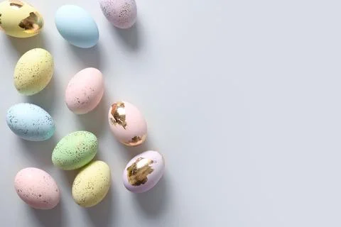 Easter pattern with pastel eggs on blue background. Stock Photos