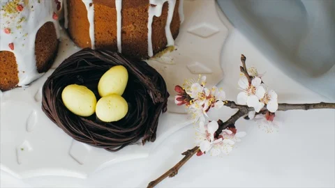 Easter Pie with icing and decoration on a wooden table Stock Footage 127428720