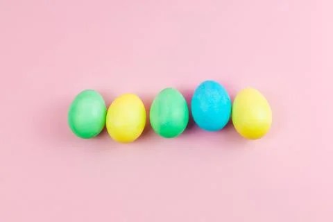 Easter pink composition. Easter eggs on pastel pink background. Minimal conce Stock Photos