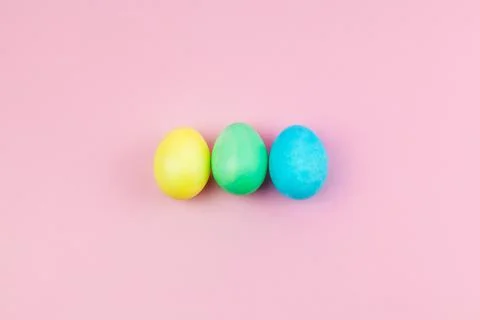 Easter pink composition. Easter eggs on pastel pink background. Minimal conce Stock Photos