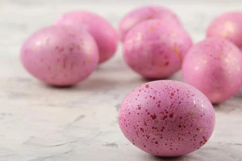 Easter. Pink Easter eggs on a light concrete background. Happy easter. holida Stock Photos