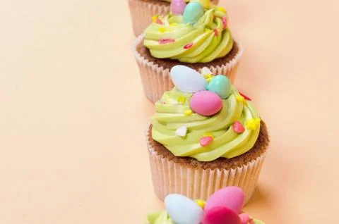 Easter pistachio cupcake with decorations Stock Photos