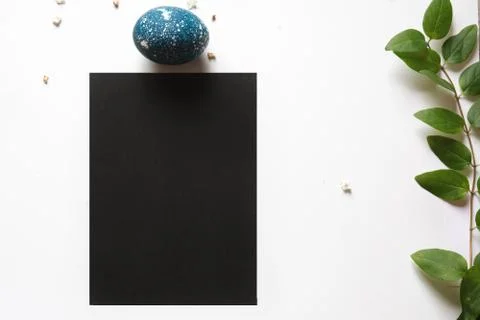 Easter place setting menu with broken egg, dyed blue Stock Photos