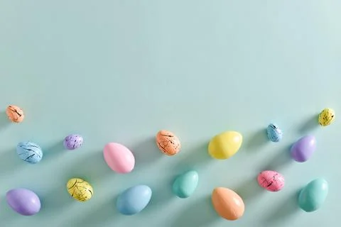 Easter postcard with bed-colored eggs with a copy of the place for the text. Stock Photos