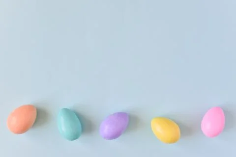 Easter postcard with bed-colored eggs with a copy of the place for the text. Stock Photos