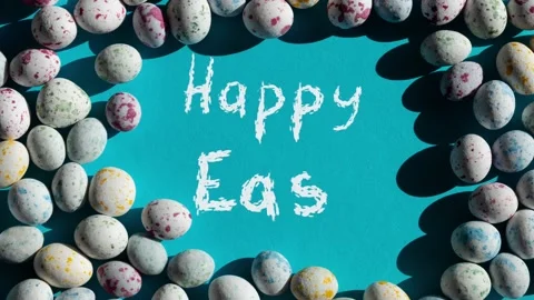 Easter postcard. chocolate flower easter eggs on a background Stock Footage 234809520