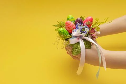 Easter postcard. Decorative bouquet for Easter in the hands of a child. Child Stock Photos
