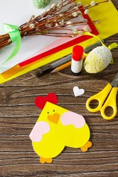Easter postcard Easter chicken on a wooden table. Handmade. Stock Photos