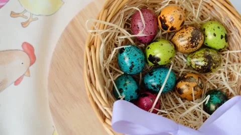 Easter quail eggs in a basket. Easter composition. Holiday concept. Rotation. Stock Footage 271531780