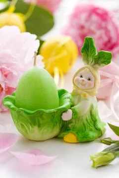 Easter rabbit and candle Stock Photos