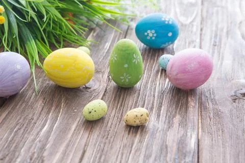 Easter rabbit with Easter eggs on wooden background. Close-up. Stock-Fotos