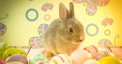 Easter rabbit with eggs in front of pattern Foto stock