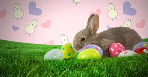 Easter rabbit with eggs in front of pattern 库存照片