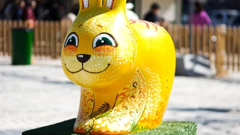 Easter rabbit figure with city background Stock Footage 88677259