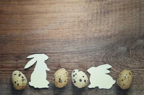 Easter rabbits with quail eggs Stock Photos