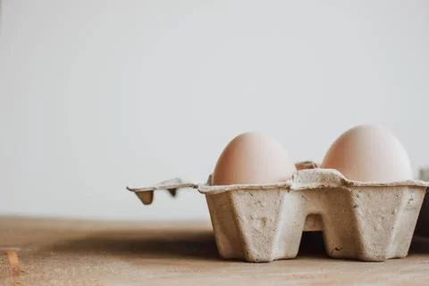 Easter raff egg. Minimal Easter concept. Craft hipster holiday package, carto Stock Photos