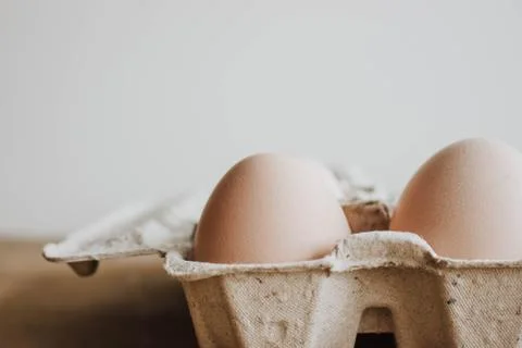 Easter raff egg. Minimal Easter concept. Craft hipster holiday package, carto Stock Photos