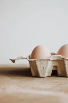 Easter raff egg. Minimal Easter concept. Craft hipster holiday package, carto Stock Photos