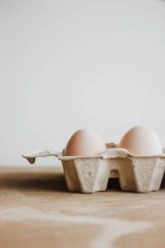 Easter raff egg. Minimal Easter concept. Craft hipster holiday package, carto Stock Photos