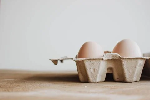 Easter raff egg. Minimal Easter concept. Craft hipster holiday package, carto Stock Photos