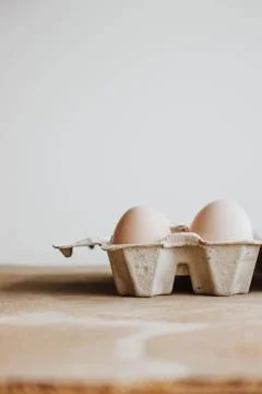 Easter raff egg. Minimal Easter concept. Craft hipster holiday package, carto Stock Photos