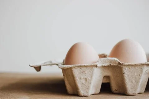 Easter raff egg. Minimal Easter concept. Craft hipster holiday package, carto Stock Photos