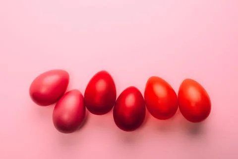 Easter red eggs on pink background Stock Photos