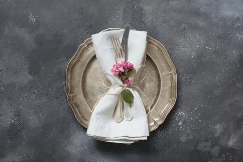 Easter romantic dinner. Elegance table setting with spring pink flowers Stock Photos