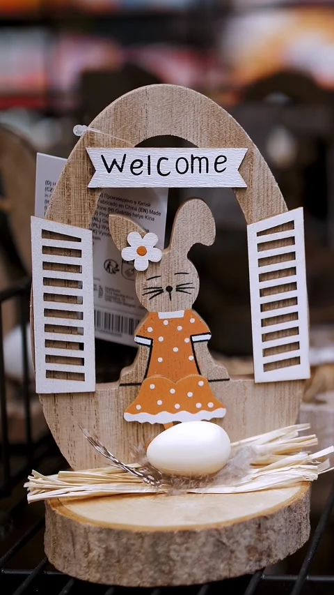 Easter sale. Different funny Easter bunny figurines, statuettes. shopping of Stock Footage 315565772
