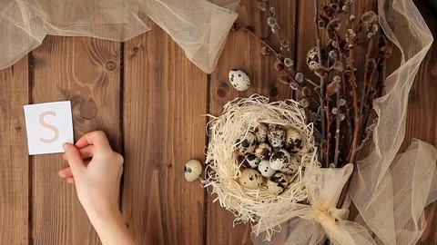 Easter sale message with Easter eggs on a wooden background. Top view (1) Stock Footage 123582820