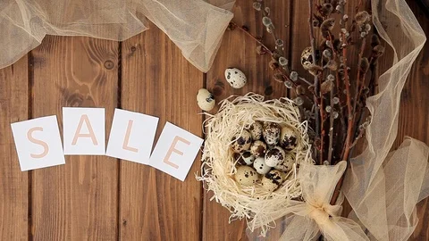 Easter sale message with Easter eggs on a wooden background. Top view (3) Stock Footage 123582824