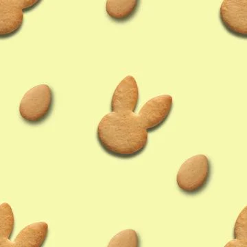 Easter seamless pattern of cookies shaped of bunny and eggs 스톡 사진
