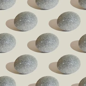 Easter seamless pattern with glitter silver eggs on gray background Stock Photos