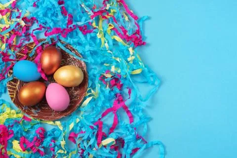 Easter set of colored eggs on bright blue background Easter holiday decoratio Stock Photos