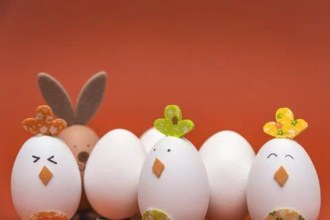 Easter spring card, colored bunny and chicken, on an orange background. print Stock Photos