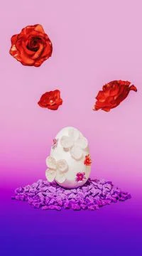 Easter spring idea made of purple decorative stones, white egg decorated Stock Photos