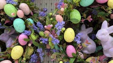 Easter Spring Wreath With Pastel Eggs Flowers And Cute Bunny Decor in the store Stock Footage 327796070