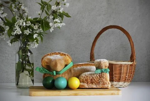 Easter still life containing two lamb cakes Stock Photos