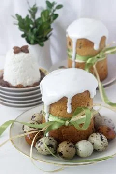 Easter still life with Easter cake kulich, paskha and painted eggs on a light Stock Photos