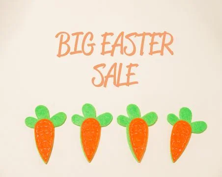 Easter still life with sample text sale on carrot background Stock-Fotos
