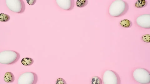 Easter stop motion pink background with quail and white chicken eggs move. Stock Footage 171450760