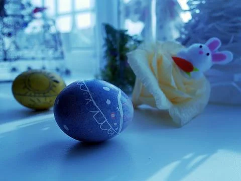 Easter story from small Easter hares and painted eggs Stock Photos