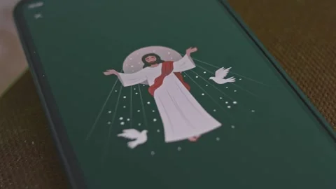 Easter Sunday Jesus Christ is Risen graphic presentation on smartphone screen Stock Footage 288964840